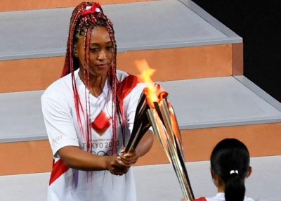 Naomi Osaka a punto de encender la antorcha olímpica Tokio 2020